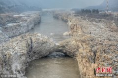 澳门太阳城集团：山西临汾壶口瀑布出现难得一见冰桥景观